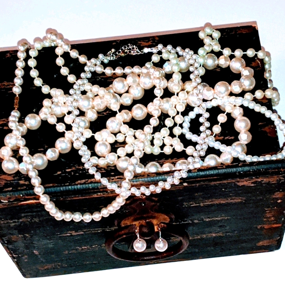 Bundle of faux pearls.